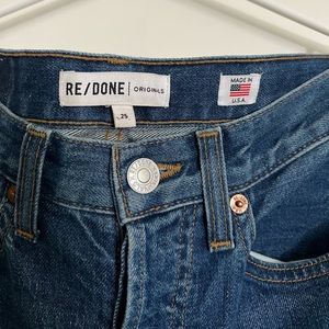 Re/done slim fit jeans with distressed hem